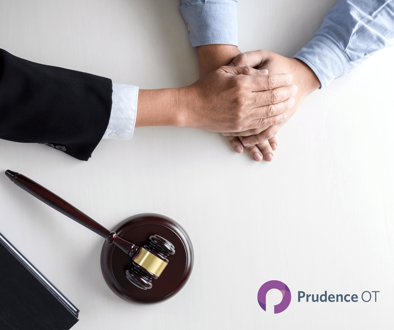 Two people shaking hands across a white table, one wearing a dark suit and the other in a light blue shirt. A gavel and a document are on the table, indicating a legal meeting likely about personal injury. The logo "Prudence OT" appears on the bottom right of the image.